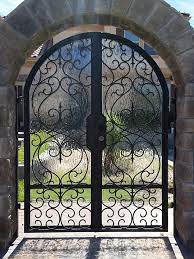 The front elevation of a. Custom Wrought Iron Entry Gates C 2020 Amador Iron Works