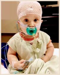 Family adopts four little miracles