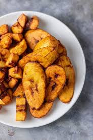Fried Plantain Learn How To Fry Plantain Like A Pro It Must Be Cooked Before It Can Be Eaten It Can B Plantain Recipes Plantains Fried How To Cook Plantains