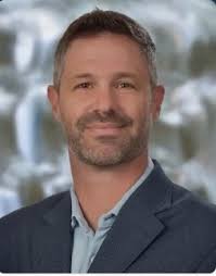 Glen Ziegler and wife with family