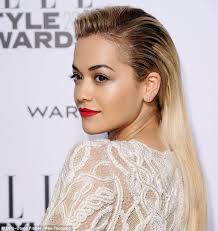 Oops: At the Elle Style Awards on Tuesday Rita&#39;s hair extensions were visible as she wore her locks in a slicked-back style - article-2565038-1B9DDF9400000578-610_634x671