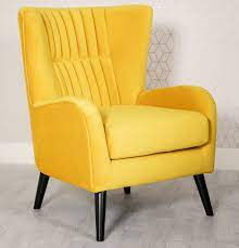 Make a sophisticated statement in your living room or home office with a classic wingback armchair. Brook Yellow Velvet Wing Back Armchair Yellow Velvet Armchair
