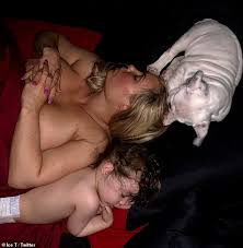 Shoe freak that loves to clean! Ice T Shares Photo Of Wife Coco Austin Topless In Bed Daily Mail Online