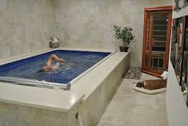 Swim spa is a machine that lets you swim constantly against a water current. Basement Pools Indoor Basement Pool Basement Ideas