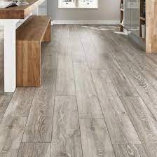 However, we can't deny the fact that the common monochromatic tile layout is becoming too safe of a style. Professional V Groove Light Grey Oak Laminate Flooring Floorrenovationideas Grey Laminate Flooring Oak Laminate Flooring Wood Laminate Flooring