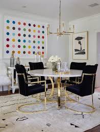Black Velvet And Brass Dining Chairs Join A Round Capiz Dining Table Illuminated By A Brass Velvet Dining Chairs Round Back Dining Chairs Wicker Dining Chairs
