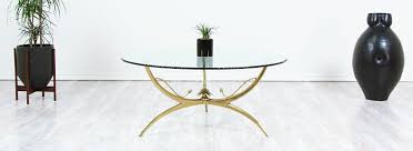 Minimalist boomerang shaped coffee or side table with a thick teak top and a walnut bottom. Mid Century Brass Lotus Flower Glass Top Coffee Table Danish Modern L A