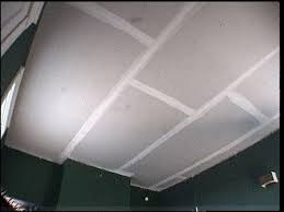 The tiles sit loosely above the grid, resting on the frame. How To Replace Ceiling Tiles With Drywall How Tos Diy