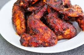 It creates a two zone, high heat grill that perfectly cooks wings every time. Grilled Sweet And Spicy Chicken Wings Recipe
