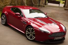Image result for Magma Red 2011 Aston Martin