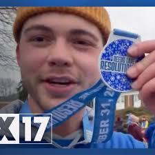 FOX 17's Sam Landstra runs the Reeds Lake Resolution Run