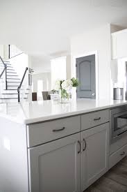 We're also loving the island vibes accenting this white and vibrant kitchen. My Friends Gorgeous Gray And White Kitchen Cuckoo4design