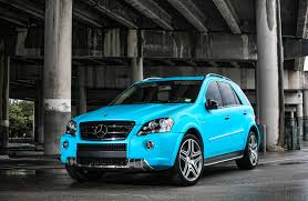 Customized Mercedes Benz Ml63 Amg With A Complete Matte Teal Exterior Mercedes Benz Benz Mercedes