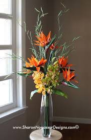 T1130128 Tall Wedding Centerpiece Bird Of Paradise C Jpg 385 594 Pixeles Large Flower Arrangements Tall Flower Arrangements Large Floral Arrangements