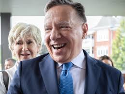 Legault a chantonné cette célèbre chanson de reggae dans un marché au  Québec (VIDÉO)