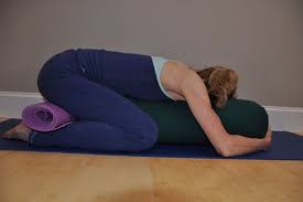 Modifying Child S Pose From Lim Yoga Restorative Yoga Poses Restorative Yoga Yoga