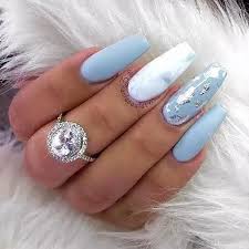 Want a cool nail design that's not fussy? Acrylic Nails Light Blue With Design Nail And Manicure Trends