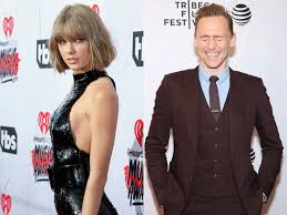 Tom hiddleston & taylor swift, back in their dating days, holding hands Taylor Swift Tom Hiddleston Fan Fiction