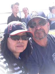 Does anyone recognize the people in the back of this photo?