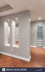 Shop a selection of decorations in a variety of colors & designs for any theme. Detail Of Wall Cutouts In Luxury Residential Basement Stock Photo Wall Cutout Half Wall Room Divider Living Room Partition Design