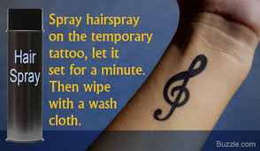 Rubbing the area with baby oil or olive oil, then scrubbing with a paper towel will likely remove it. 11 Super Easy Ways To Remove Temporary Tattoos Without Any Fuss Thoughtful Tattoos