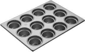 Grants manufacture muffin trays in many sizes and styles to suit all industrial, commercial or domestic ovens. Amazon Com Focus Foodservice 905525 Cupcake Muffin Pan 24 Cup Silver Kitchen Dining