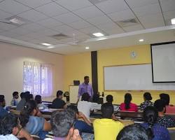 Image of Mangalore University professor teaching in a classroom