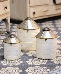 White kitchen canisters keep ingredients sealed and organized in decorative cylinders. White Silo Canisters Set Of 3 Allysons Place