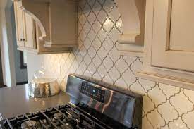 Jun 19, 2021 · achieving a modern farmhouse kitchen has never been easier than with these tin inspired peel and stick backsplash tiles the textured and dimensional tile has cool undertones and metallic accents that lend to its modern style. Backsplash Highland Park Arabesque Antique White With Iron Grout Antique White Kitchen White Kitchen Backsplash Antique White Cabinets