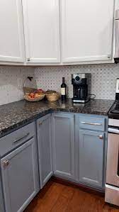 For an interesting, contrasting look, try a wooden or butcher block countertop. What Backsplash And Cabinets Color Could Improve This