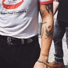 Maybe you would like to learn more about one of these? Pin By Calu On Calum Hood Flower Tattoo Calum Hood Tattoos