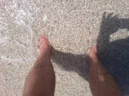 sink your feet in the sand