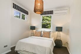 A staged home calls for scenery—for example, a ficus tree, a beautiful chair and a side table with accessories. How To Stage A Small Bedroom Foxy Home Staging
