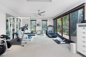 These tiles will last a very long time and look great for years. What S The Best Flooring For A Home Gym Pro Flooring