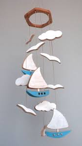 mobile pour bebe en bois chambre de bebe cadeau de naissance bateau nuage oiseaux bleu blanc jouets en bois pour enfants mobile bebe decoration bois