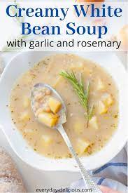 Simple And Quick To Make Soup With Just A Few Ingredients And Amazing Flavor A Generous Amount Of Garlic And Fresh Rose White Bean Soup Bean Soup Quick Dishes