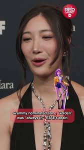 Grammy nominations are "up, up up" for the KPop Demon Hunters team! The  nominated hit "Golden," co-written by EJAE, the voice of Rumi, was always  in her mind.