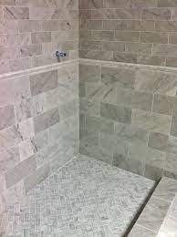 Amazing bathroom features upper walls painted gray and lower walls clad in creamy white marble tiles finished with a white chair rail. Venetino Marble Shower Walls Floor And Chair Rail Tile In This Master Bathroom Marble Shower Walls Shower Tile Travertine Shower