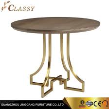 In smaller spaces, consider a round walnut dining table for four or six instead. Classic Quality Round Walnut Dining Table With Metal Base China Dining Table Set Tables Made In China Com