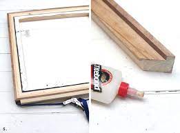 Picture frame molding (homedepot.com has many choices) Diy Custom Framing No Power Tools Required A Beautiful Mess Diy Canvas Frame Diy Frame Diy Picture Frames