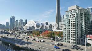 Downtown toronto is home to the entertainment district, which has the largest concentration of nightclubs, theatres and other cool venues in ontario. Downtown Toronto Cn Tower And Rogers Cen Stock Video Pond5