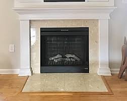 Learn how to prep the old brick and fireplace surround, and how to tile a fireplace for a fresh, modern look! How To Paint Faux Subway Tile A Diy Fireplace Makeover