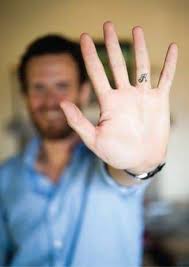 Black initials word tattoo on wrist. Finger Tattoos For Men Tattoo Wedding Rings Ring Finger Tattoos Romantic Wedding Rings