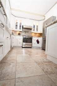The exposed wood plank ceiling matches the white oak floor of this space. 42 Amazing Ideas Kitchen Remodels With White Cabinets For 2019 Homenthusiastic Kitchen Remodel Photos Tan Kitchen Kitchen Floor Tile