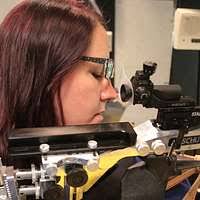 Photos of Master-at-Arms 2nd Class Sean Brazas, a Naval