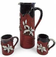 Sold at Auction: Vintage Peter Petrie signed Pottery mug