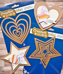 Scisor out some floral patterns from your favorite graphic45 paper. Making Shaped Cards With Creative Dies Plus Kim Dellow