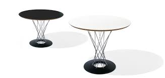 A smaller sized noguchi cyclone cafe sized table with white formica top, chromed crossed wire pedestal and satin black steel base. Cyclone Dining Table Knoll