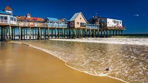 5 New England Boardwalks Worth A Visit This Summer Old Orchard Beach Maine Beaches Old Orchard Beach Maine
