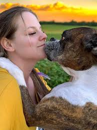 Mom and Son's Special Bond with Their Boxer